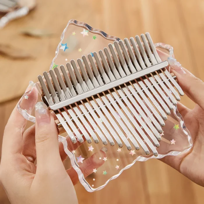 A wavy petal-shaped transparent acrylic kalimba with 21 keys from HUASHU’s Starry Series.