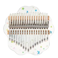 A transparent flower-shaped acrylic kalimba with 17 metal keys and colorful star patterns.