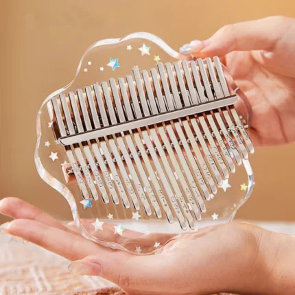 A handheld transparent petal-shaped acrylic kalimba with 21 keys from HUASHU’s Starry Series.